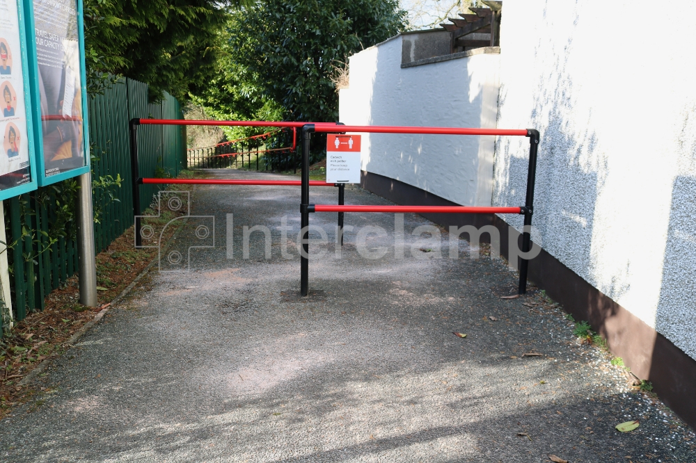 Barrier constructed using Interclamp key clamp fittigns to prevent vehicle access to railway platform